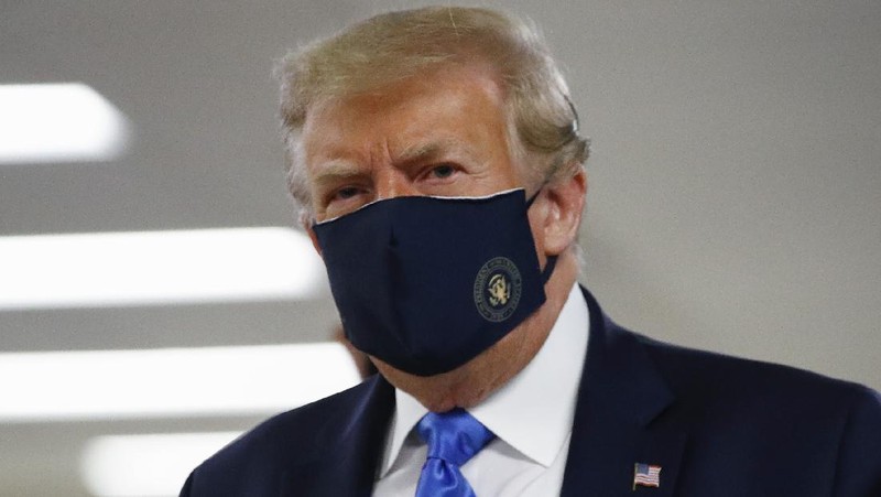 President Donald Trump arrives for a news conference at the White House, Tuesday, July 21, 2020, in Washington. (AP Photo/Evan Vucci)