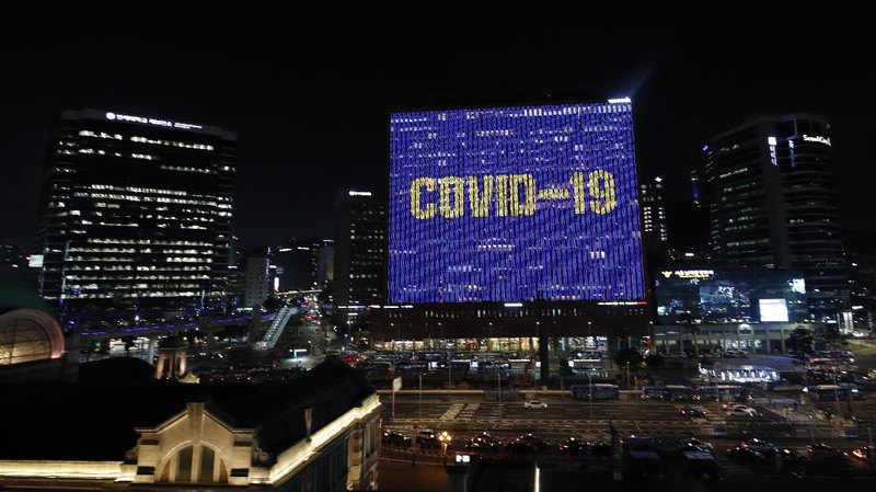 A message of gratitude and support for health workers, frontline workers, and the country battling the new coronavirus is displayed on a building in Seoul, South Korea, Monday, July 20, 2020. (AP Photo/Lee Jin-man)