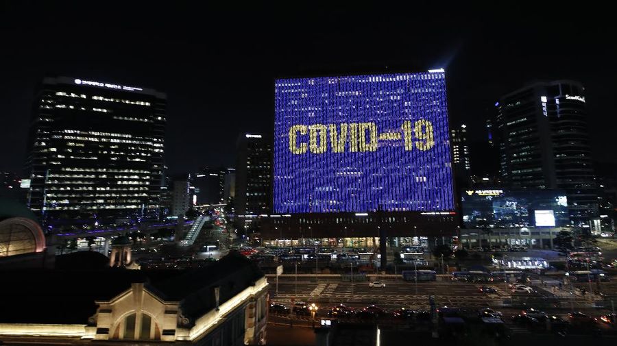 A message of gratitude and support for health workers, frontline workers, and the country battling the new coronavirus is displayed on a building in Seoul, South Korea, Monday, July 20, 2020. (AP Photo/Lee Jin-man)
