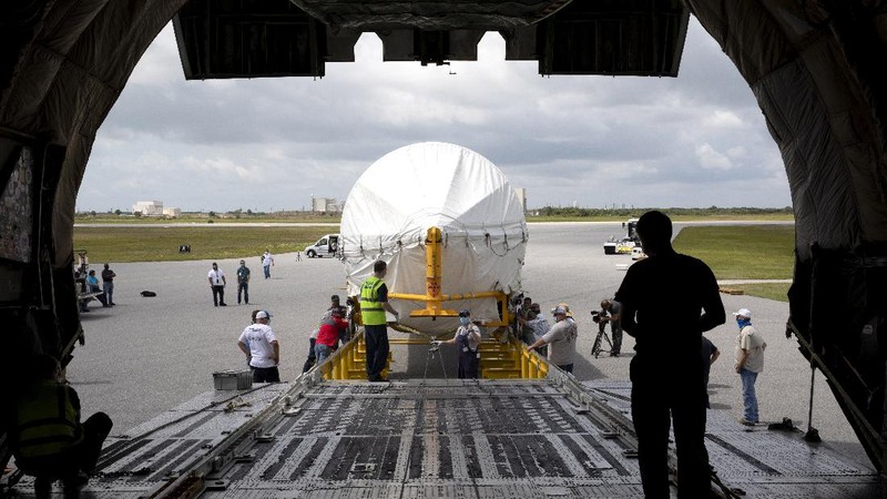 In this view from inside the Antonov 124 cargo aircraft, the United Launch Alliance booster for NASA’s Mars Perseverance rover is offloaded at the Skid Strip at Cape Canaveral Air Force Station (CCAFS) in Florida on May 19, 2020. The Mars Perseverance rover is scheduled to launch in mid-July atop a United Launch Alliance Atlas V 541 rocket from Pad 41 at CCAFS. The rover is part of NASA’s Mars Exploration Program, a long-term effort of robotic exploration of the Red Planet. The rover will search for habitable conditions in the ancient past and signs of past microbial life on Mars. The Launch Services Program at Kennedy is responsible for launch management.