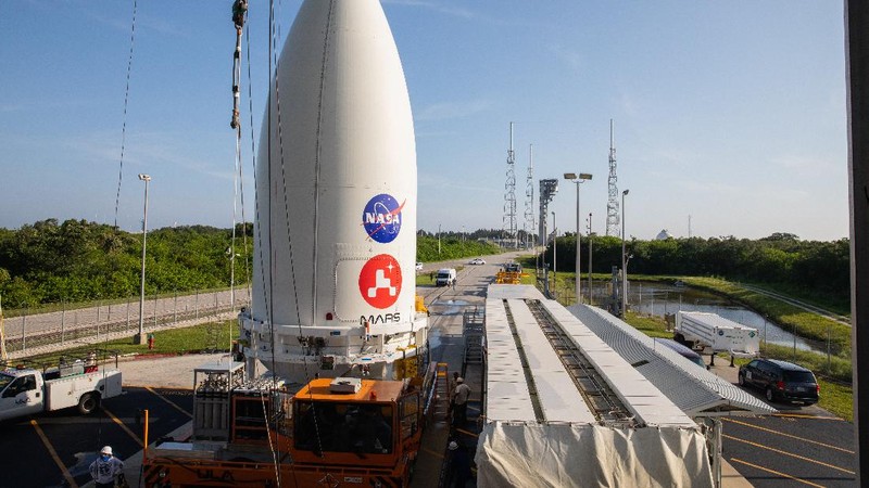 In this view from inside the Antonov 124 cargo aircraft, the United Launch Alliance booster for NASA’s Mars Perseverance rover is offloaded at the Skid Strip at Cape Canaveral Air Force Station (CCAFS) in Florida on May 19, 2020. The Mars Perseverance rover is scheduled to launch in mid-July atop a United Launch Alliance Atlas V 541 rocket from Pad 41 at CCAFS. The rover is part of NASA’s Mars Exploration Program, a long-term effort of robotic exploration of the Red Planet. The rover will search for habitable conditions in the ancient past and signs of past microbial life on Mars. The Launch Services Program at Kennedy is responsible for launch management.