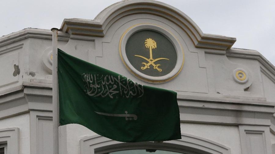 The Saudi Arabia flag flies outside the country's consul general's official residence in Istanbul, Wednesday, Oct. 24, 2018. Turkey's state-run news agency says Saudi officials did not allow Turkish investigators, probing the killing of Saudi journalist Jamal Khashoggi, to search a well in the garden of the Saudi Consulate. Turkish forensic teams have searched the Consulate, the consul general's official residence as well as vehicles belonging to the consulate as part of their probe into Khashoggi's disappearance and death. (AP Photo/Lefteris Pitarakis)
