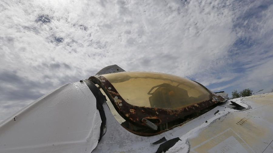 Lockheed C-5 Galaxy cargo jets are stored, as shown with this fisheye lens photograph, at the 309th Aerospace Maintenance and Regeneration Group boneyard Thursday, May 14, 2015 at Davis-Monthan Air Force Base in Tucson, Ariz. The C-5A Galaxy the largest aircraft in the U.S. armed services. (File Photo/AP Photo/Matt York)