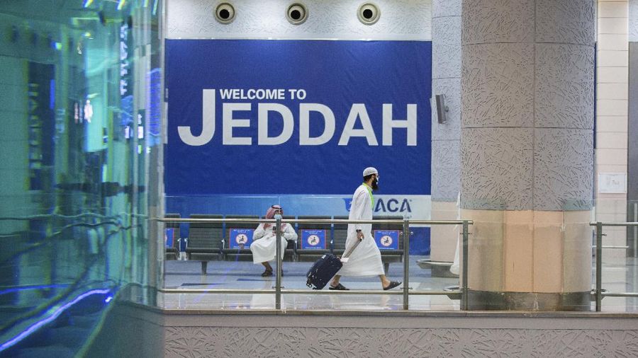 Pilgrims arrive to King Abdulaziz Airport for the Hajj pilgrimage to Mecca, in Jeddah, Saudi Arabia, Saturday, July 25, 2020. Saudi Arabia issued guidelines for about 1,000 pilgrims who will be allowed to perform the hajj pilgrimage in Mecca later this month (Saudi Ministry of Media via AP)