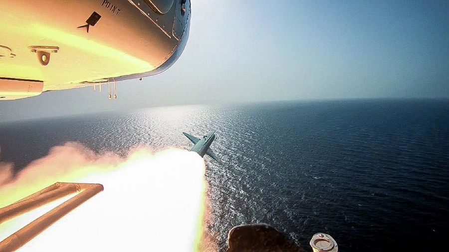 In this photo released Tuesday, July 28, 2020, by Sepahnews, a Revolutionary Guard's speed boat fires a missile during a military exercise. Iranian commandos also fast-roped down from a helicopter onto a replica of an aircraft carrier in the exercise called 