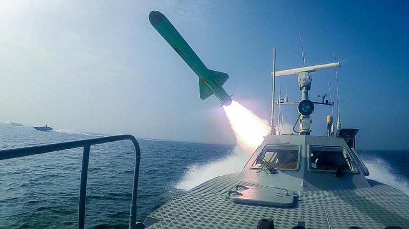 In this photo released Tuesday, July 28, 2020, by Sepahnews, a Revolutionary Guard's speed boat fires a missile during a military exercise. Iranian commandos also fast-roped down from a helicopter onto a replica of an aircraft carrier in the exercise called 