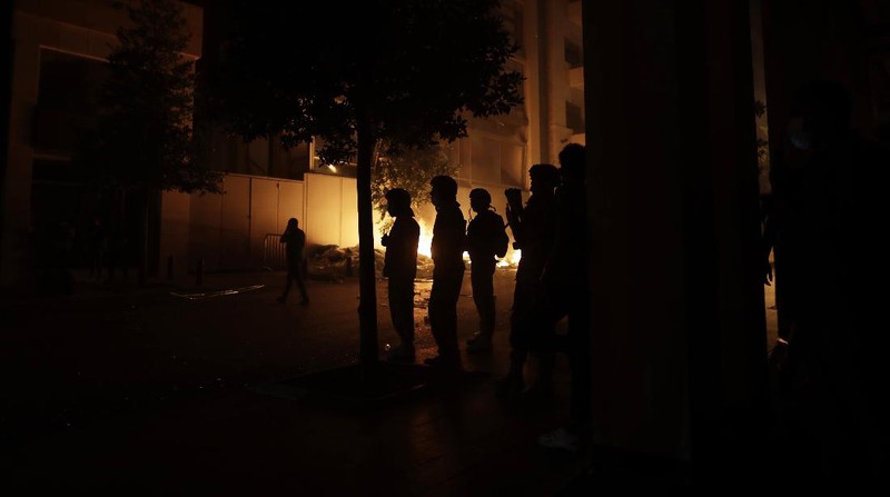 Demo tuntut pemerintah mundur di Lebanon berujung ricuh. (AP/Hassan Ammar)
