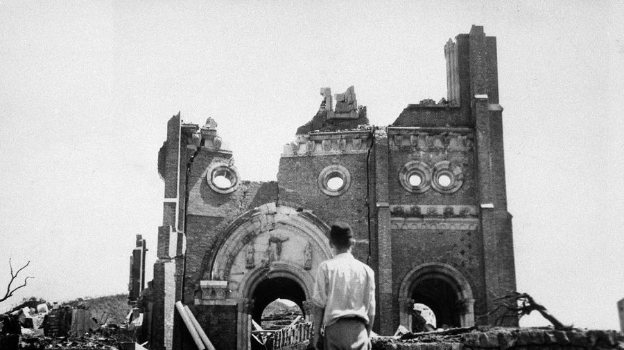 FILE - In this Sept. 13, 1945, file photo, the Urakami Catholic Cathedral in Nagasaki, Japan, stands waste in the aftermath of the detonation of the atom bomb over a month ago over this city. The city of Nagasaki in southern Japan marks the 75th anniversary of the U.S. atomic bombing of Aug. 9, 1945. It was a second nuclear bomb dropped by the U.S. three days after it made the world’s first atomic attack on Hiroshima. Japan surrendered on Aug. 15, ending World War II and its nearly a half-century aggression toward Asian neighbors. Dwindling survivors, whose average age exceeds 83, increasingly worry about passing their lessons on to younger generations.(AP Photo/Stanley Troutman, Pool, File)