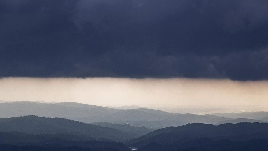 Rain clouds are seen over the Kangra Valley after a rainfall in Dharmsala, India, Wednesday, July 22, 2020. (AP Photo/Ashwini Bhatia)