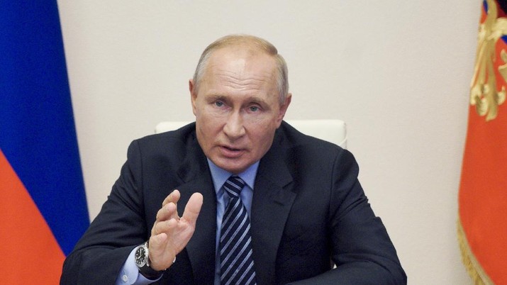 Vladimir Putin AP/Alexei Nikolsky Russian President Vladimir Putin attends a cabinet meeting at the Novo-Ogaryovo residence outside Moscow, Russia, Tuesday, Aug. 11, 2020. Putin says that a coronavirus vaccine developed in the country has been registered for use and one of his daughters has already been inoculated. Speaking at a government meeting Tuesday, Aug. 11, 2020, Putin said that the vaccine has proven efficient during tests, offering a lasting immunity from the coronavirus. (Alexei Nikolsky, Sputnik, Kremlin Pool Photo via AP)