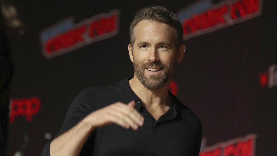 FILE - This Oct. 3, 2019 file photo shows Ryan Reynolds at New York Comic Con. Stay-at-home orders, traveling fears and the cancellation of sporting events, concerts and theme parks have forced the Make-a-Wish foundation to come to a stand-still, leaving young people’s requests in holding patterns. The charity has introduced “Messages of Hope,” encouraging the public and celebrities to record inspiring messages and upload them to social media, and so far, stars like Reynolds have already participated. (AP Photo/Steve Luciano, File)