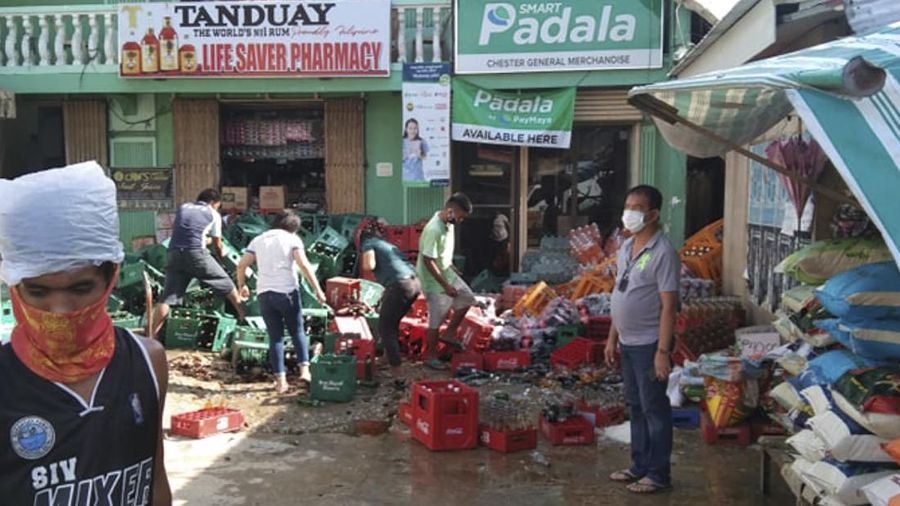 In this photo provided by the Philippine Red Cross, a toppled house is seen after a quake struck in Cataingan, Masbate province, central Philippines on Tuesday Aug. 18, 2020. A powerful and shallow earthquake struck a central Philippine region Tuesday, prompting people to dash out of homes and offices but there were no immediate reports of injuries or major damage. (John Mark Lalaguna/Philippine National Red Cross via AP)