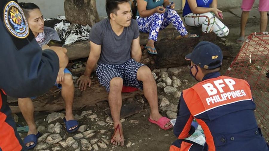 In this photo provided by the Philippine Red Cross, a toppled house is seen after a quake struck in Cataingan, Masbate province, central Philippines on Tuesday Aug. 18, 2020. A powerful and shallow earthquake struck a central Philippine region Tuesday, prompting people to dash out of homes and offices but there were no immediate reports of injuries or major damage. (John Mark Lalaguna/Philippine National Red Cross via AP)