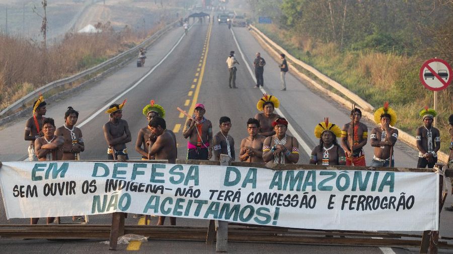 Kayapo Indigenous block highway BR-163y near Novo Progresso, Para state, Brazil, Monday, Aug. 17, 2020. Protesters blocked the road to pressure Brazilian President Jair Bolsonaro to better shield them from COVID-19, to extend damages payments for road construction near their land, and to consult them on a proposed railway to transport soybeans and corn. (AP Photo/Andre Penner)