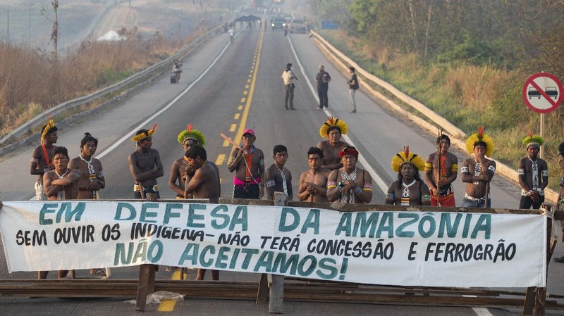 Kayapo Indigenous block highway BR-163y near Novo Progresso, Para state, Brazil, Monday, Aug. 17, 2020. Protesters blocked the road to pressure Brazilian President Jair Bolsonaro to better shield them from COVID-19, to extend damages payments for road construction near their land, and to consult them on a proposed railway to transport soybeans and corn. (AP Photo/Andre Penner)