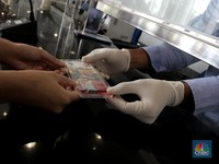 Rupiah Lemas, Dolar AS Balik ke Rp 14.700