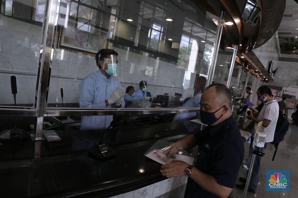 Melihat Penukaran Uang Baru Rp 75.000 di Kantor Pusat BI - Foto 1