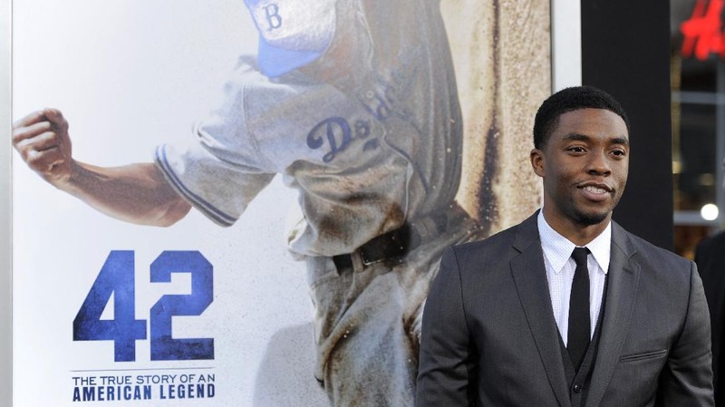 FILE - In this Tuesday, April 9, 2013 file photo, Chadwick Boseman, who plays baseball legend Jackie Robinson in 