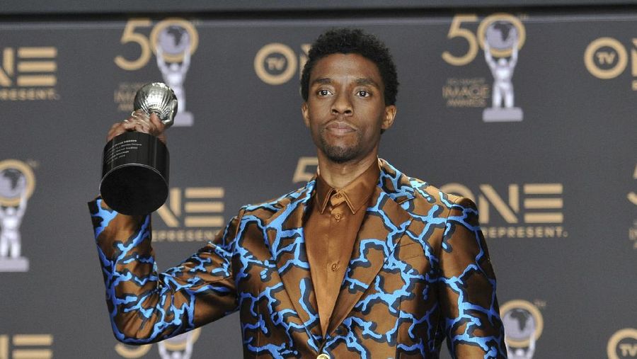 FILE - In this Tuesday, April 9, 2013 file photo, Chadwick Boseman, who plays baseball legend Jackie Robinson in 