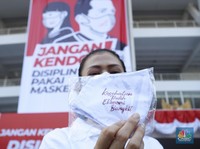 Pakai Masker Bikin Bau Mulut, Mitos Atau Fakta?