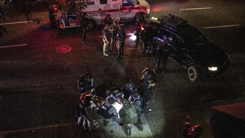 Satu orang tewas tertembak mati di Portland, Oregon, Amerika Serikat. (AP/Paula Bronstein)