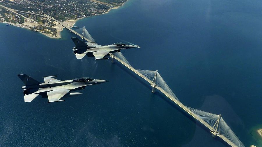 A pair of F16 block 52Ms fighters of the Greek airforce fly over the Rio-Antirio bridge in Northwest Peloponnese on Wednesday May 26, 2010. Heavily indebted Greece spends more of its gross domestic product on the military as a percentage of GDP than any other EU country largely because of its fear of Turkey, and there are increasing calls for this spending to be slashed. But ironically, some of the countries which have provided rescue loans to prevent Athens from defaulting - and who have been pushing for Greece to implement harsh austerity measures - also want the country to buy their expensive warplanes and ships. (AP Photo/Dimitris Manakanatas)