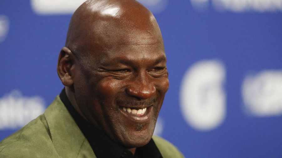 FILE - In this Jan. 24, 2020 file photo, former basketball superstar Michael Jordan speaks during a news conference ahead of NBA basketball game between Charlotte Hornets and Milwaukee Bucks in Paris. DraftKings shares jumped 4% in morning trading, Wednesday, Sept. 2, 2020 after announcing that Jordan would take an ownership stake in the company in exchange for becoming a special adviser to the sports betting site. (AP Photo/Thibault Camus, File)