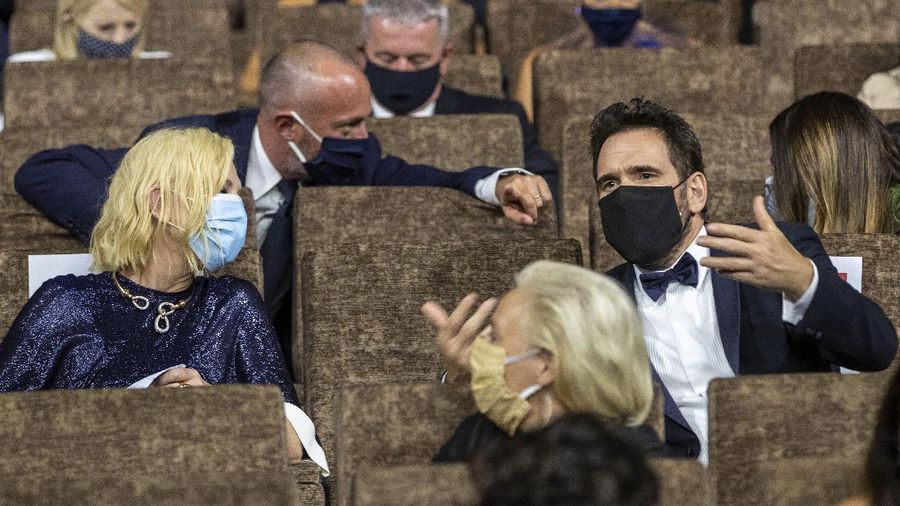 From right, actors Luigi Lo Cascio, Linda Caridi and Laura Morante with director Daniele Luchetti and actor Adriano Giannini pose during the photo call for the movie Lacci opening the 77th edition of the Venice Film Festival at the Venice Lido, Italy, Tuesday, Sept. 2, 2020. The Venice Film Festival will go from Sept. 2 through Sept. 12. Italy was among the countries hardest hit by the coronavirus pandemic, and the festival will serve as a celebration of its re-opening and a sign that the film world, largely on pause since March, is coming back as well. (AP Photo/Domenico Stinellis)