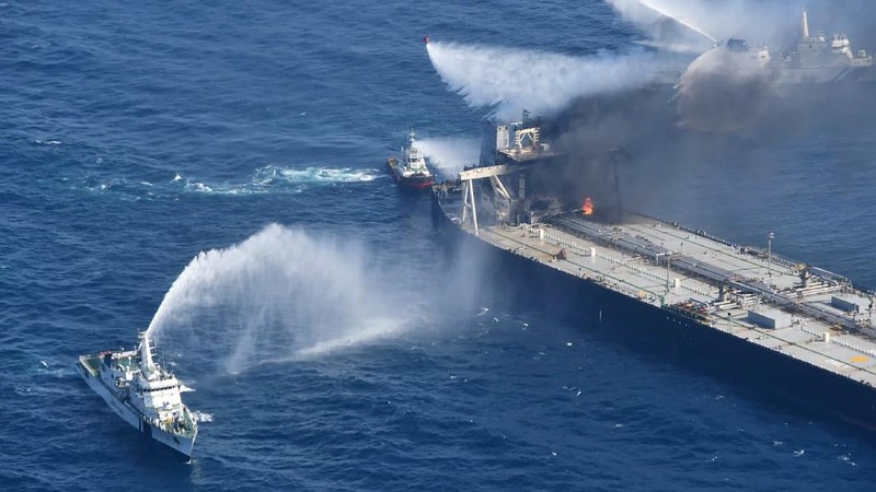 This photo released by Sri Lankan Air Force shows smoke rising after a fire broke out on a Panama-registered oil tanker about 38 nautical miles (70 kilometers) east of Sri Lanka, Thursday, Sept.3, 2020. (Sri Lankan Air Force via AP)