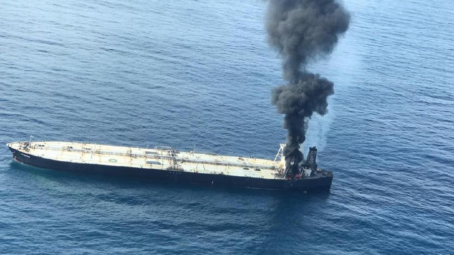 This photo released by Sri Lankan Air Force shows smoke rising after a fire broke out on a Panama-registered oil tanker about 38 nautical miles (70 kilometers) east of Sri Lanka, Thursday, Sept.3, 2020. (Sri Lankan Air Force via AP)