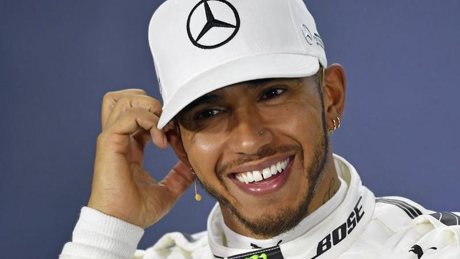 Lewis Hamilton/AP Photo/Andy Brownbill