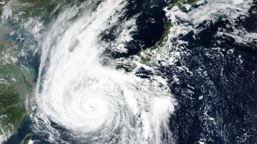 This Sunday, Sept. 6, 2020, satellite image released by NASA Worldview, Earth Observing System Data and Information System (EOSDIS) shows Typhoon Haishen barreling toward the main southwestern island of Kyushu on Sunday. The second powerful typhoon to slam Japan in a week has unleashed fierce winds and rain on southern islands, blowing off rooftops and leaving homes without power as it edged northward into an area vulnerable to flooding and mudslides. (NASA via AP)