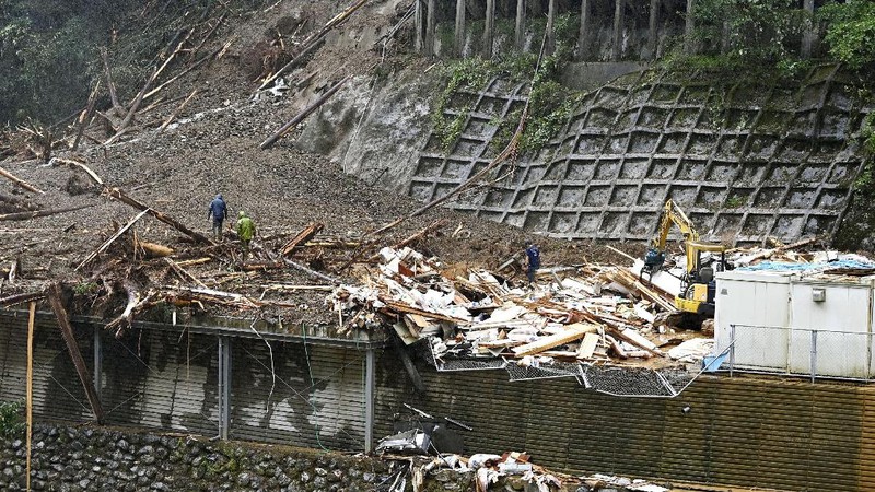 The roofs of a car factory are seen on sidewalk after typhoon hit Fukuoka, southwestern Japan Monday, Sept. 7, 2020. The second powerful typhoon to slam Japan in a week left people injured, damaged buildings, caused blackouts at nearly half a million homes and paralyzed traffic in southern Japanese islands before headed to South Korea.(Kyodo News via AP)