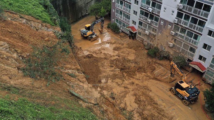 A coastal road is damaged by waves caused by Typhoon Haishen in Ulsan, South Korea, Monday, Sept. 7, 2020. A powerful typhoon damaged buildings, flooded roads and knocked out power to thousands of homes in South Korea on Monday after battering islands in southern Japan and injuring dozens of people. (Kim Yong-tai/Yonhap via AP)