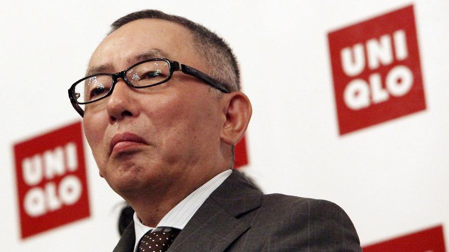 Japanese billionaire clothing retailer Tadashi Yanai attends a press conference where he launched his clothing retail outlet UNIQLO on Monday April 6, 2009 in Singapore. Yanai criticized his government's response to a severe recession as too tepid and called for tax cuts to spur domestic consumption.(AP Photo/Wong Maye-E)
