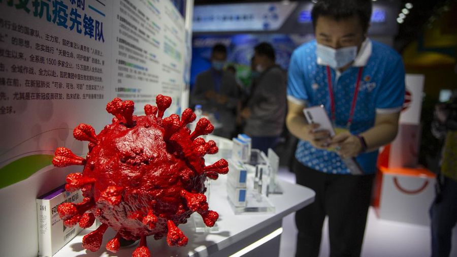 A box for a COVID-19 immunoglobin treatment is displayed at an exhibit by Chinese pharmaceutical firm Sinopharm at the China International Fair for Trade in Services (CIFTIS) in Beijing, Saturday, Sept. 5, 2020. With the COVID-19 pandemic largely under control, China's capital on Saturday kicked off one of the first large-scale public events since the start of the coronavirus outbreak, as tens of thousands of attendees were expected to visit displays from nearly 2,000 Chinese and foreign companies showcasing their products and services. (AP Photo/Mark Schiefelbein)