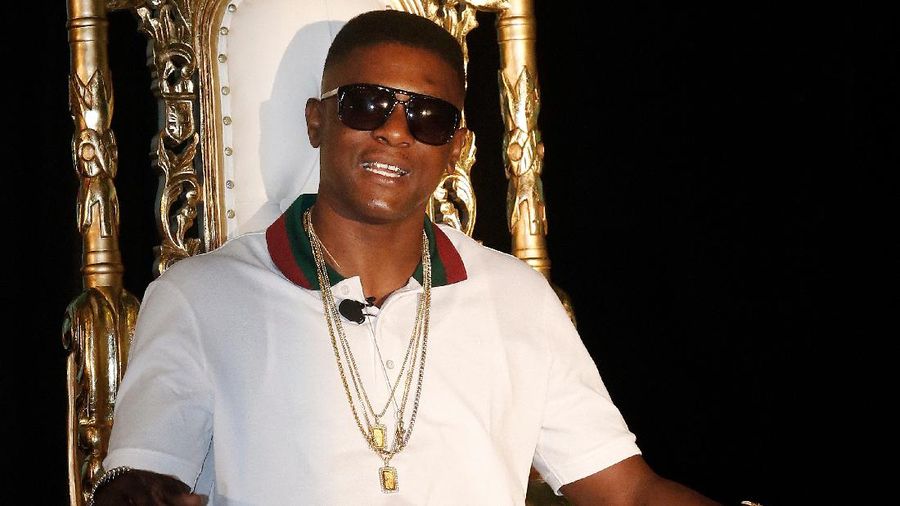 FILE - In this March 10, 2014, file photo, rapper Boosie Badazz appears at a news conference in New Orleans. The security guard who used pepper spray on a crowd including rapper Boosie Badazz says he did so as he was trying to get the group to leave and a man was trying to start a fight with him. In an interview with The Sun Herald, 55-year-old Glen Kerley denied allegations that he used racial slurs. He spoke with the newspaper after winning a $233,000 default judgment against the Louisiana rapper. (AP Photo/Bill Haber, File)