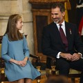 Spain's King Felipe sits next to his daughter Princess Leonor during a ceremony in which Princess Leonor was presented with the insignia of the "Toison de Oro" (Order of the Golden Fleece) during a ceremony at the Royal Palace in Madrid, Spain, Tuesd