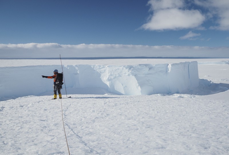 In this handout photo provided by British Antarctic Survey, field guide Andy Hood is seen at the Brunt ice shelf in Antarctica in January 2020. Antarctica remains the only continent without COVID-19 and now in Sept. 2020, as nearly 1,000 scientists and others who wintered over on the ice are seeing the sun for the first time in months, a global effort wants to make sure incoming colleagues don't bring the virus with them. (Robert Taylor/British Antarctic Survey via AP)