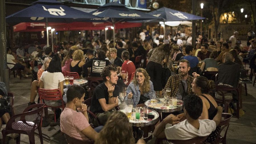 People gather at a bar in Marseille, southern France, Saturday, Sept. 12, 2020. French Prime Minister Jean Castex warned that the virus situation is 