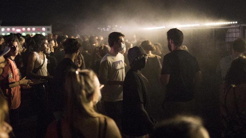 People gather at a bar in Marseille, southern France, Saturday, Sept. 12, 2020. French Prime Minister Jean Castex warned that the virus situation is 