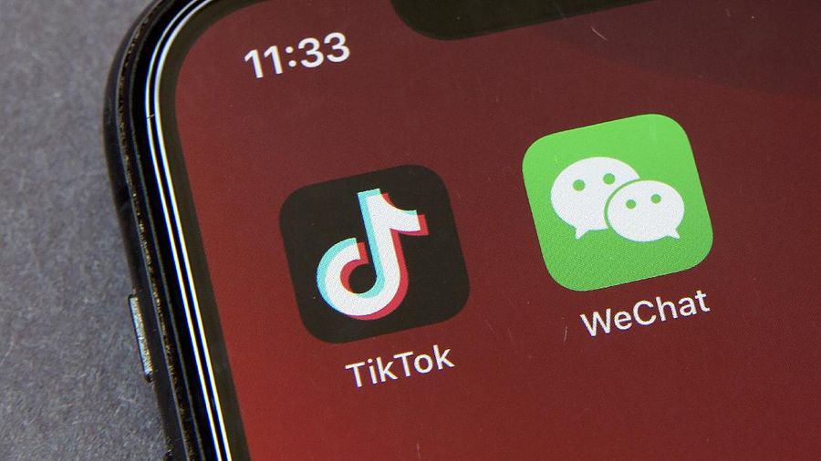 FILE - A federal judge has approved a request from a group of WeChat users to delay looming U.S. government restrictions that could effectively make the popular app nearly impossible to use. In a ruling dated Saturday, Sept. 19, 2020, Magistrate Judge Laurel Beeler in California said the government’s actions would affect users’ First Amendment rights as an effective ban on the app removes their platform for communication. (AP Photo/Mark Schiefelbein, File)