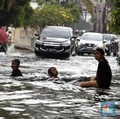 Benarkah Banjir Bisa Memperparah Penularan Covid-19 di RI?