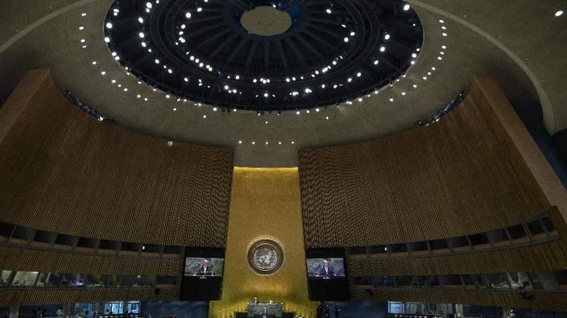 In this photo provided by the United Nations, Secretary-General António Guterres speaks from the podium, center, during the 75th session of the United Nations General Assembly, Tuesday, Sept. 22, 2020, at U.N. headquarters in New York. The U.N.'s first virtual meeting of world leaders started Tuesday with pre-recorded speeches from some of the planet's biggest powers, kept at home by the coronavirus pandemic that will likely be a dominant theme at their video gathering this year. (Eskinder Debebe/UN via AP)