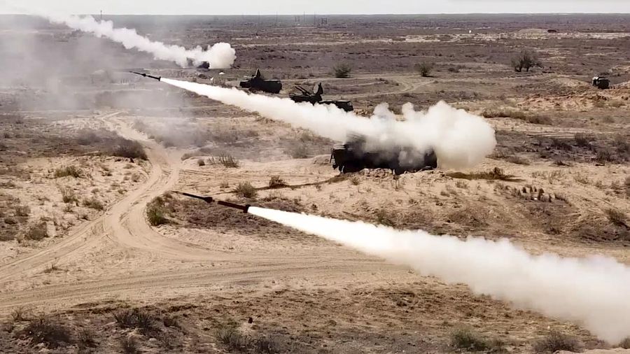 In this photo taken from a footage released on Sept. 22, 2020 by the Russian Defense Ministry Press Service, rockets launch from missile systems at the Ashuluk military base in Southern Russia. Russian Air Defense systems successfully repelled aerial strike during joined military drills in the south of Russia. The drills, expected to be held in Black Sea and Caspian sea waters, will take place until September 26th. Belarus, Armenia, China, Pakistan and Myanmar will also take part in the exercises. (Russian Defense Ministry Press Service via AP)