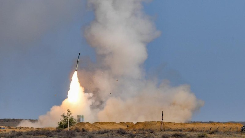 In this photo released on Sept. 22, 2020 by Russian Defense Ministry Press Service, a rocket launches from missile system at the Ashuluk military base in Southern Russia. Russian Air Defense systems successfully repelled aerial strike during joined military drills in the south of Russia. The drills, expected to be held in Black Sea and Caspian sea waters, will take place until September 26th. Belarus, Armenia, China, Pakistan and Myanmar take part in the exercises. (Andrey Rusov/Russian Defense Ministry Press Service via AP)