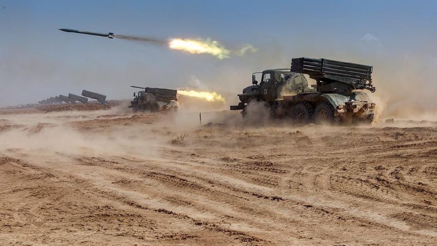 In this photo taken from a footage released on Sept. 22, 2020 by Russian Defense Ministry Press Service, rockets launch from missile systems at the Ashuluk military base in Southern Russia. Russian Air Defense systems successfully repelled aerial strike during joined military drills in the south of Russia. The drills, expected to be held in Black Sea and Caspian sea waters, will take place until September 26th. Belarus, Armenia, China, Pakistan and Myanmar take part in the exercises. (Vadim Grishankin/Russian Defense Ministry Press Service via AP)