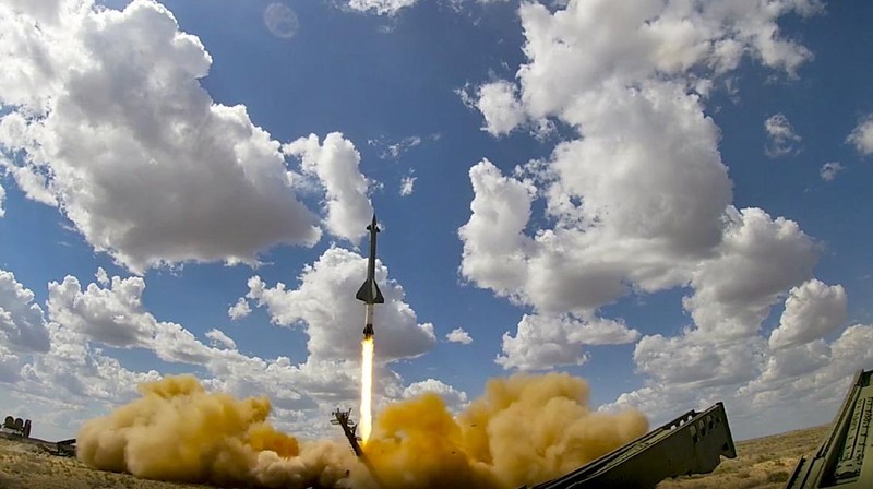 In this photo released on Sept. 22, 2020 by Russian Defense Ministry Press Service, a rocket launches from missile system at the Ashuluk military base in Southern Russia. Russian Air Defense systems successfully repelled aerial strike during joined military drills in the south of Russia. The drills, expected to be held in Black Sea and Caspian sea waters, will take place until September 26th. Belarus, Armenia, China, Pakistan and Myanmar take part in the exercises. (Andrey Rusov/Russian Defense Ministry Press Service via AP)
