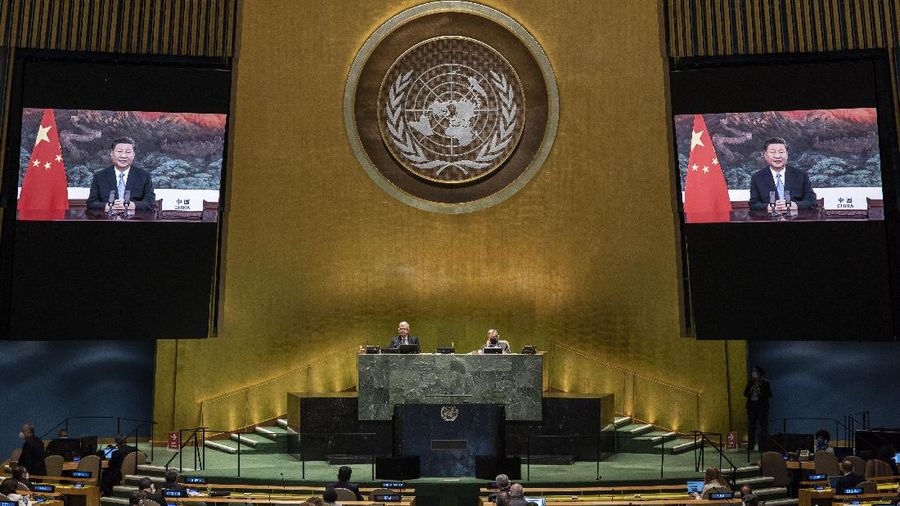 In this photo provided by the United Nations, Chinese President Xi Jinping's pre-recorded message is played during the 75th session of the United Nations General Assembly, Tuesday, Sept. 22, 2020, at U.N. headquarters in New York. The U.N.'s first virtual meeting of world leaders started Tuesday with pre-recorded speeches from some of the planet's biggest powers, kept at home by the coronavirus pandemic that will likely be a dominant theme at their video gathering this year. (Eskinder Debebe/UN via AP)