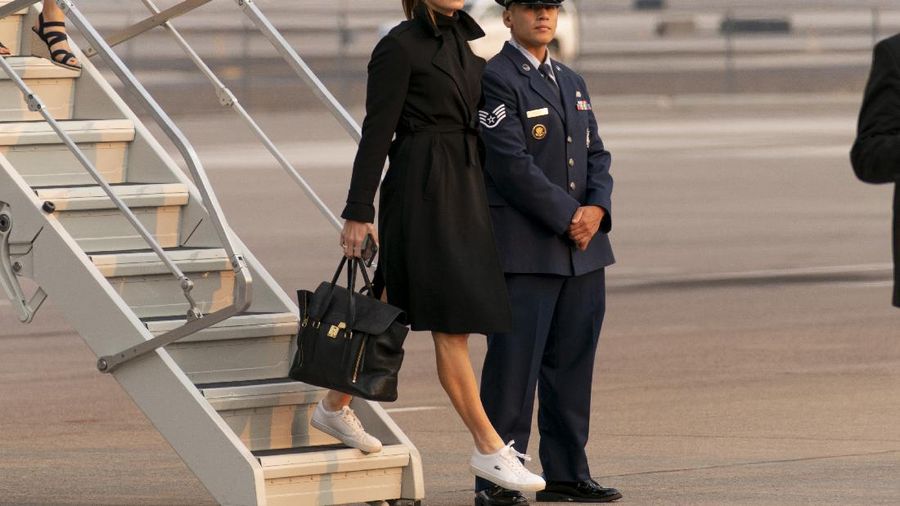 Counselor to the President Hope Hicks walks from Marine One to accompany President Donald Trump aboard Air Force One as he departs Wednesday, Sept. 30, 2020, at Andrews Air Force Base, Md. (AP Photo/Alex Brandon)